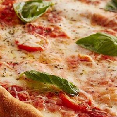 a close up of a slice of pizza