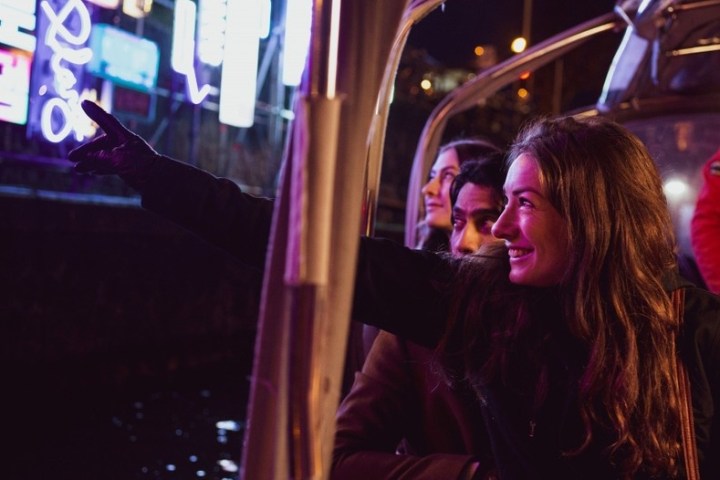 a person sitting in a dark room