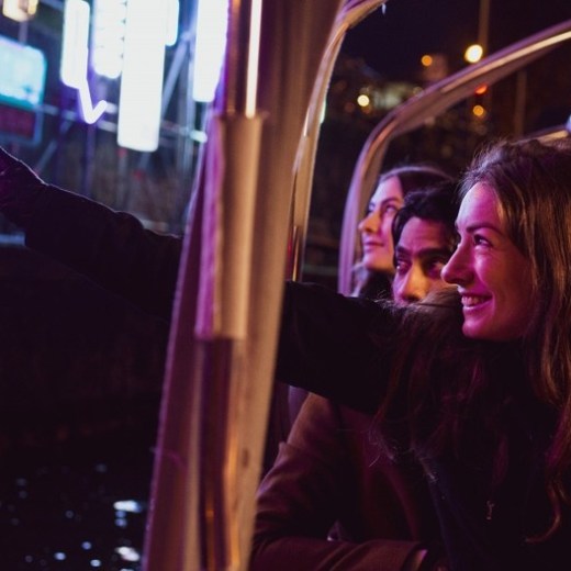a person sitting in a dark room